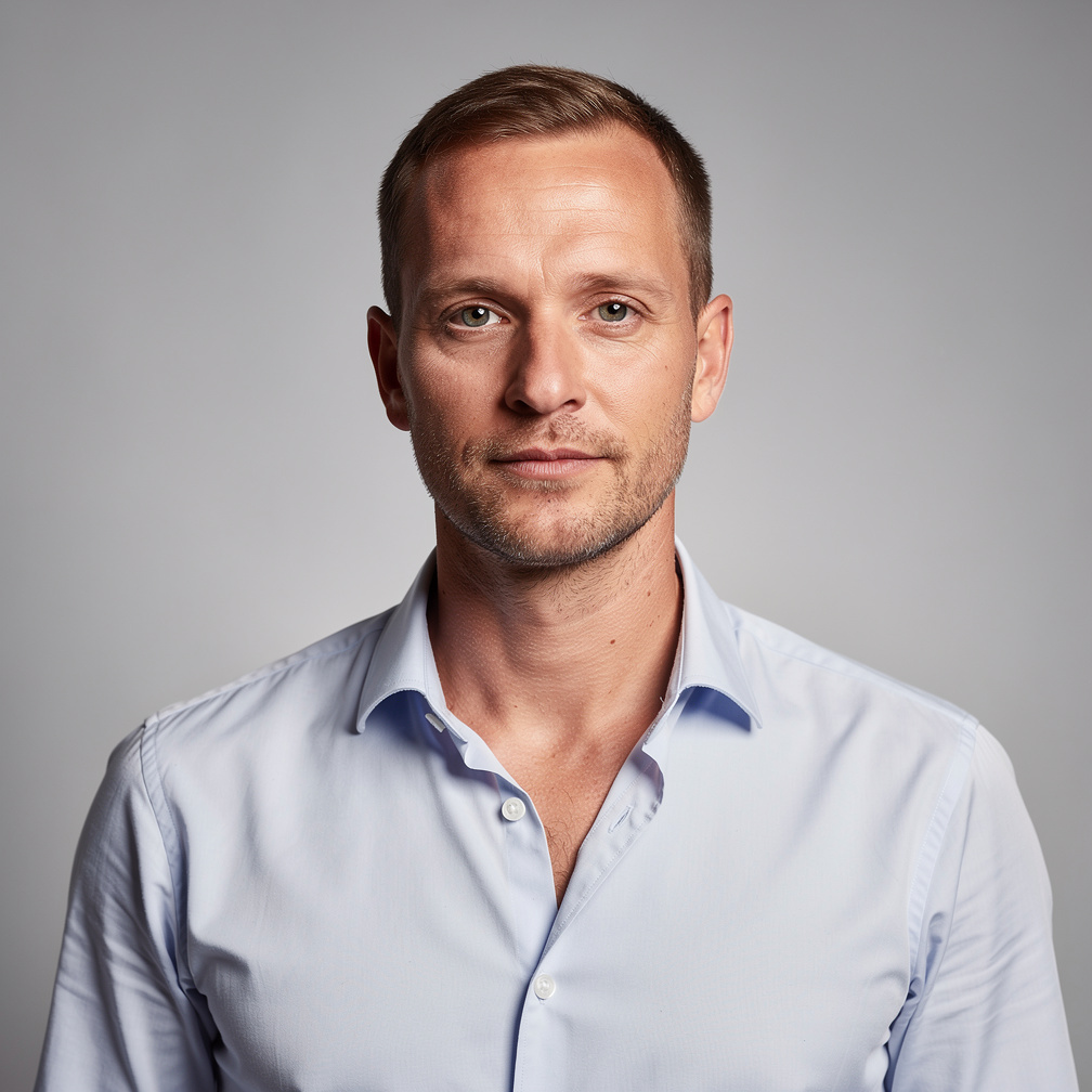 Studio portrait of a European man with a casual shirt